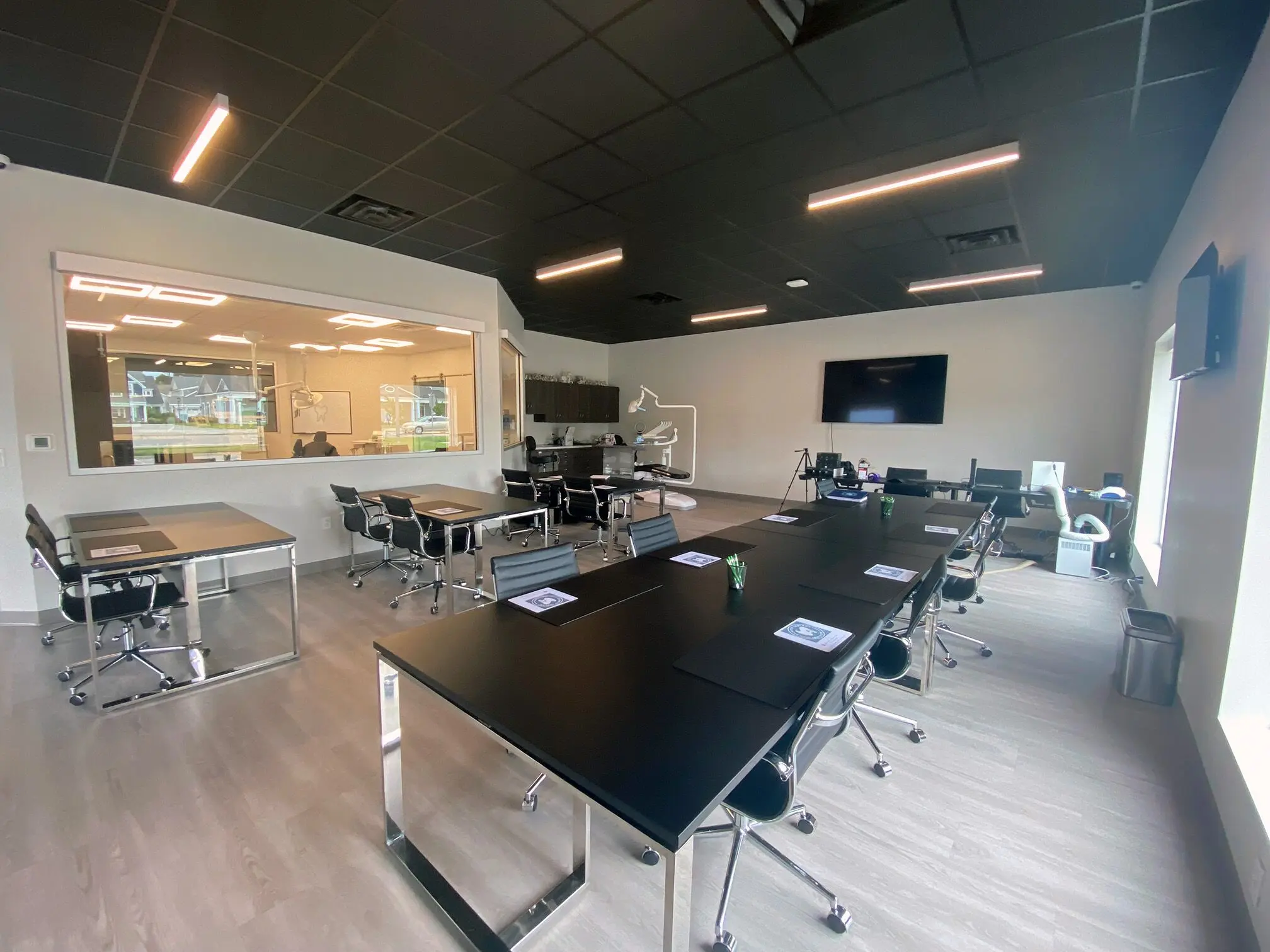 The Atlantic Implant Institute lecture room set for a business course session